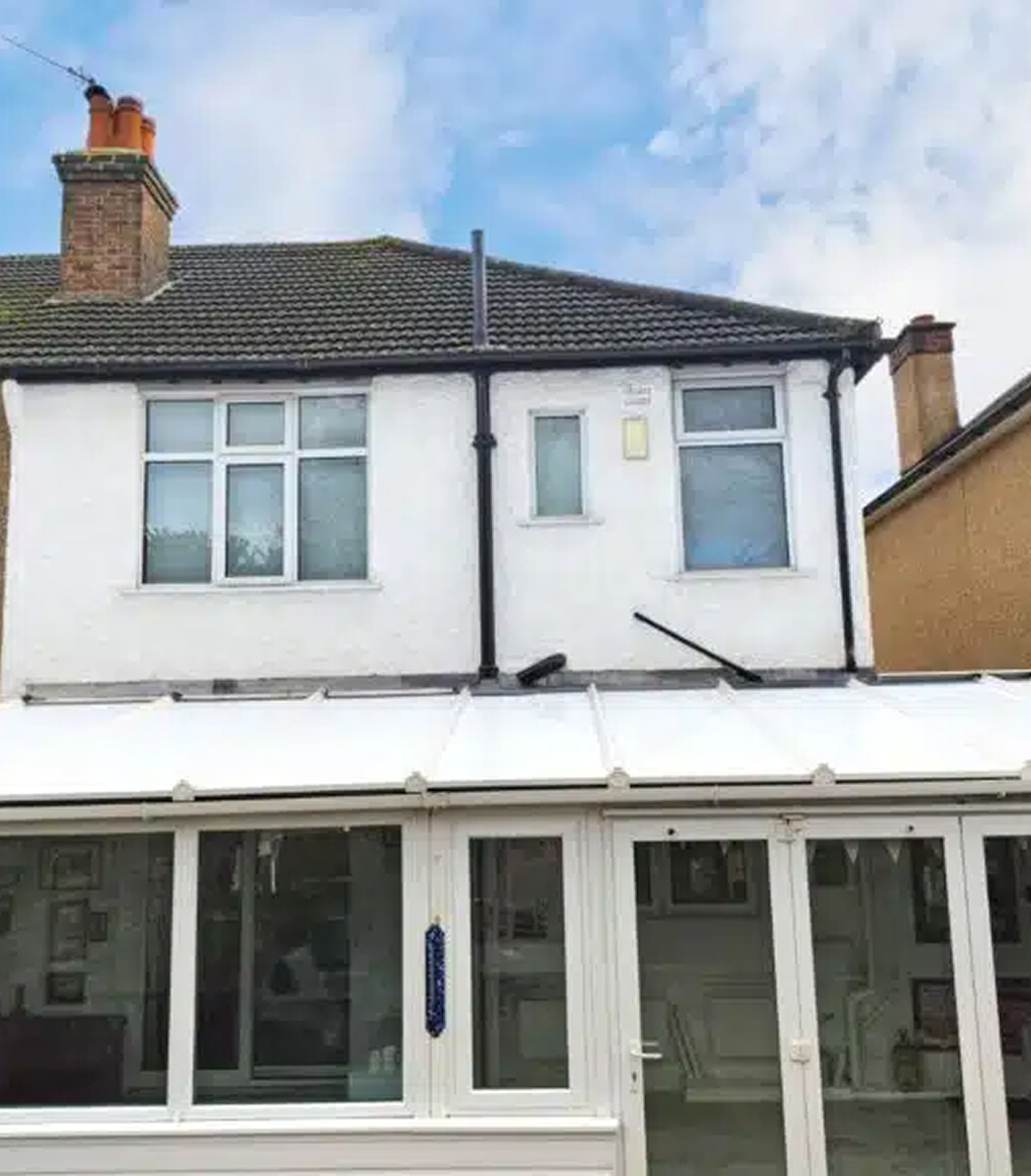 Conservatory roof replacement by Rosy Roof in Swindon, showcasing modern insulated panels and a stylish design for enhanced energy efficiency and comfort.