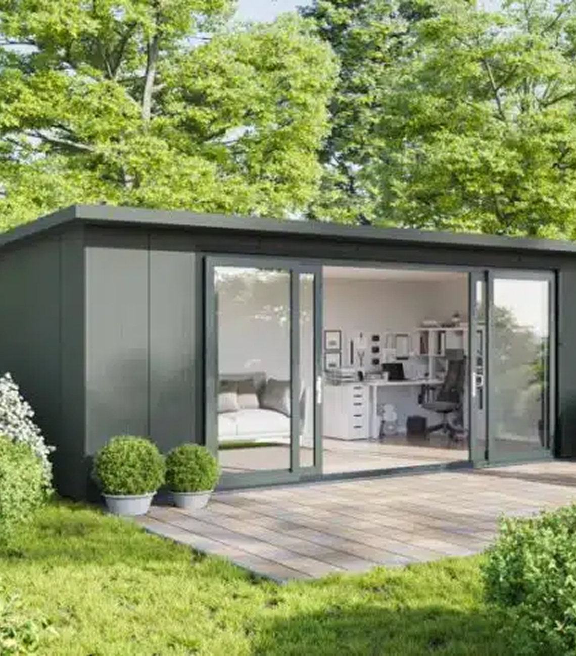 Modern conservatory with large glass doors, surrounded by greenery and patio, showcasing a comfortable interior space ideal for home office or relaxation, emphasizing energy efficiency and style for conservatory roof replacement in Cardiff.