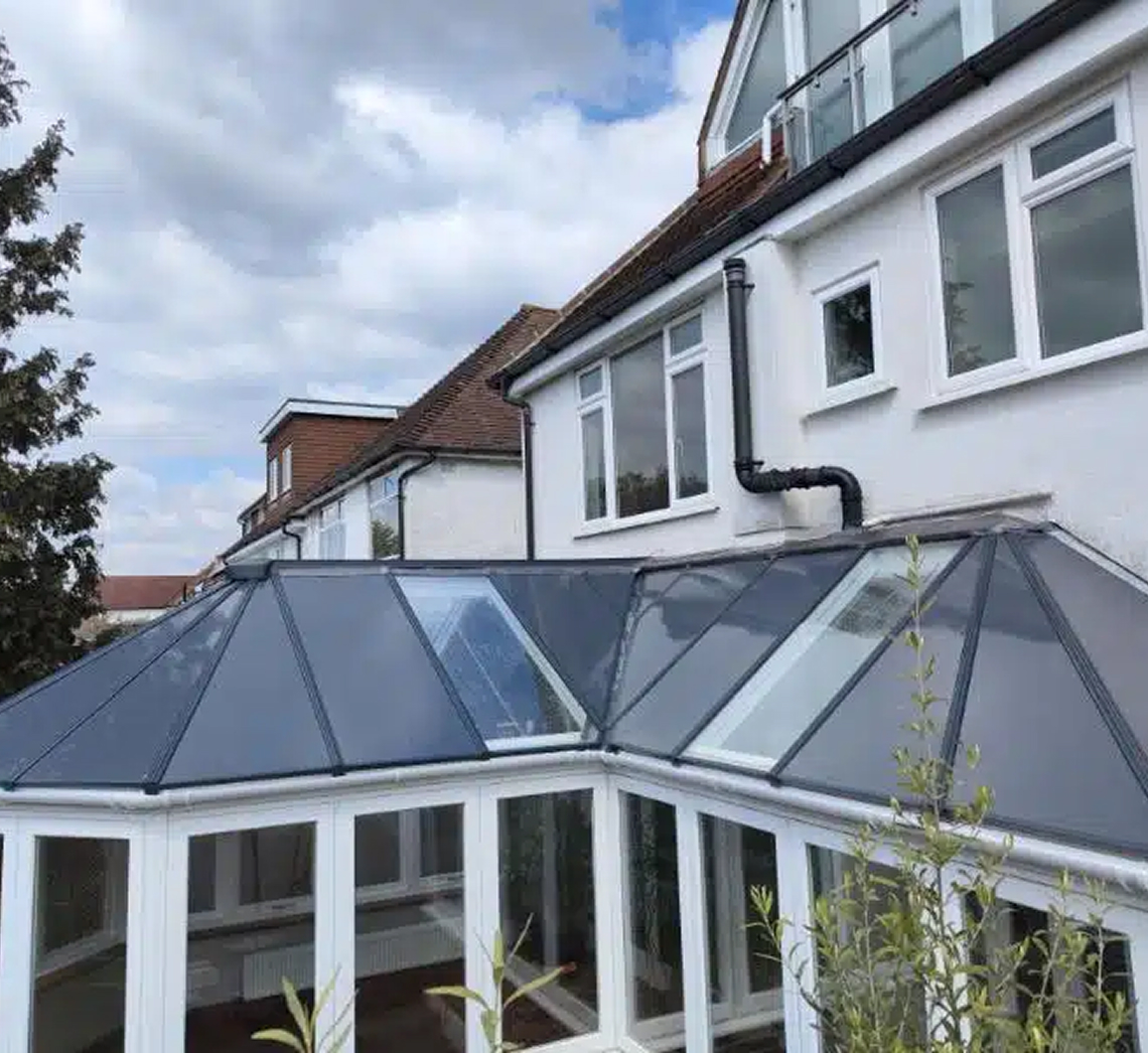 Conservatory roof replacement featuring modern glass panels, enhancing thermal performance and aesthetics for year-round comfort in Bristol.
